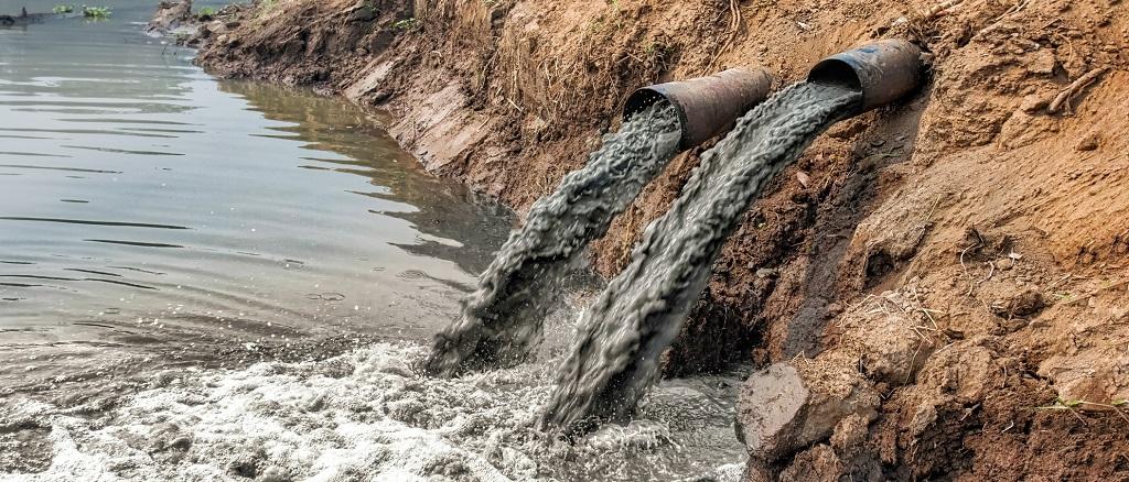 Pipes Discharging Slurry into Water Body